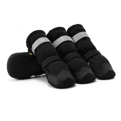 Dog shoes with anti-slip soles and reflective straps for protective outdoor adventures.